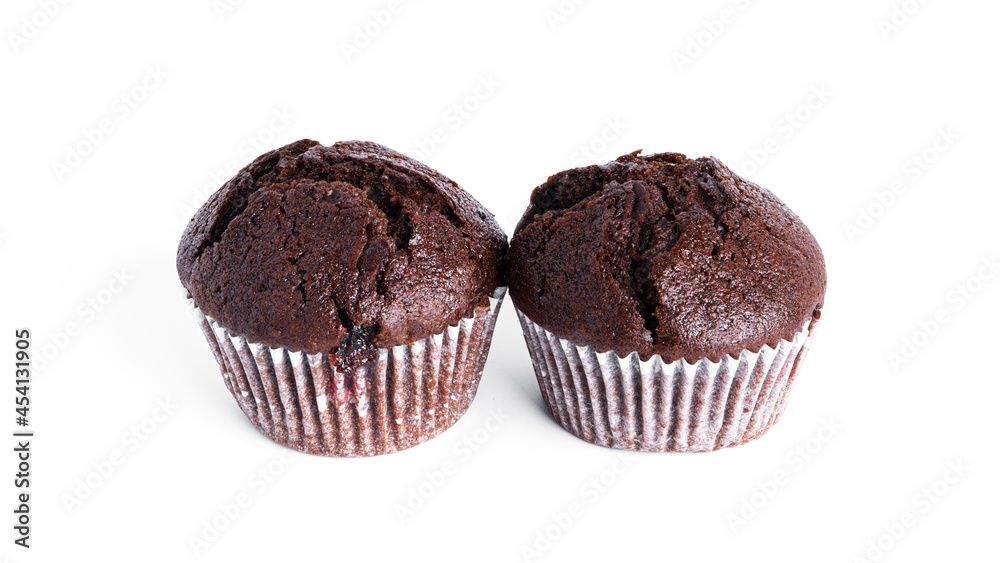 Chocolate cupcakes with cherry jam isolated on a white background. Chocolate muffin.