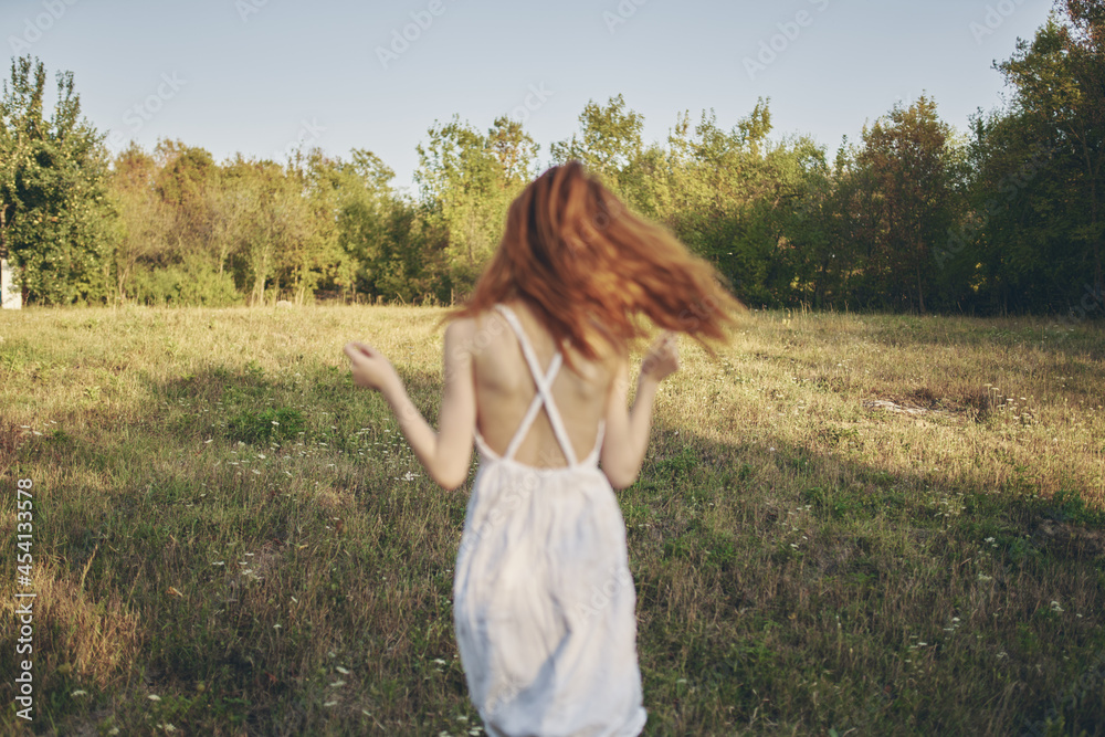 woman in white dress Walk in the field rest greens woman in white dress Walk in the field rest greens