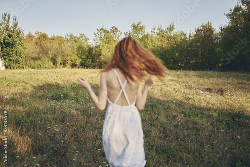 woman in white dress Walk in the field rest greens