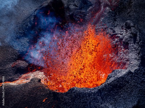 Looking at the lavaflow from the erupting volcanic crater of Geldingadalagos eruption in Reykjanes peninsula, Iceland.