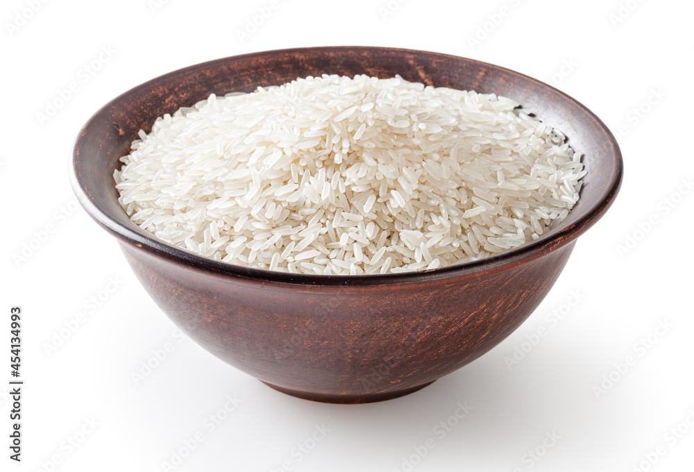 Uncooked jasmine rice in ceramic bowl isolated on white background Uncooked jasmine rice in ceramic bowl isolated on white background