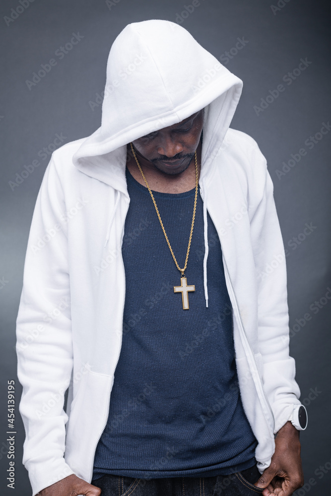 Young man offers a variety of poses and attitudes during a studio photo session Young man offers a variety of poses and attitudes during a studio photo session