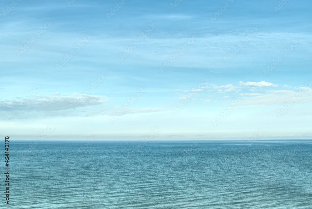 Blue Bright Sky and blue sea background in sunny day. tranquil background