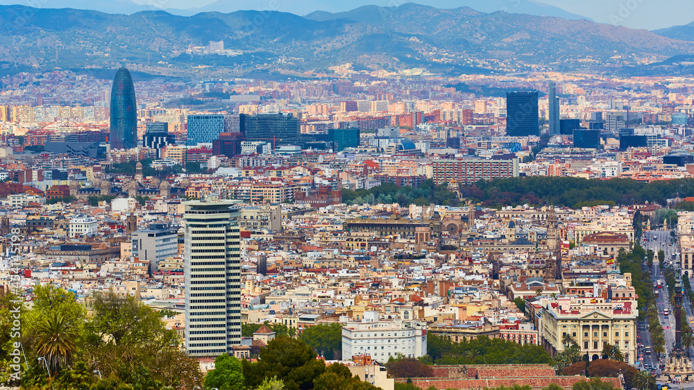 Top view of Barcelona from Montjuic hill in cloudy day. Catalonia.