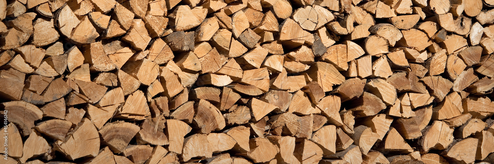 Stack of wood logs, wooden abstract panoramic background Stack of wood logs, wooden abstract panoramic background