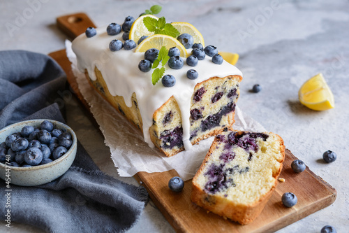 Lemon blueberry loaf of bread cake with sugar glaze