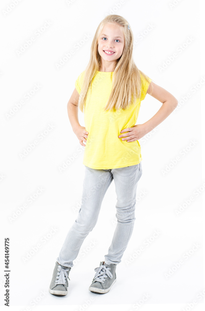 Full length image of a pretty little girl, posing. Isolated on white background
Full length image of a pretty little girl, posing. Isolated on white background