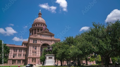 2021 Aug - Day Time Time Lapse of White Clouds Over the Texas State Capitol Dome Statue and Flag