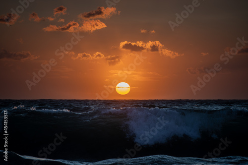 Fototapeta Naklejka Na Ścianę i Meble -  sunset over the wavy sea in Corsica