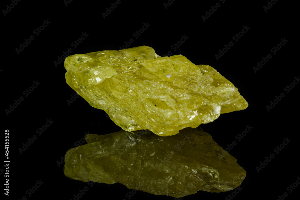 Macro mineral sulfur stone on a black background Macro mineral sulfur stone on a black background