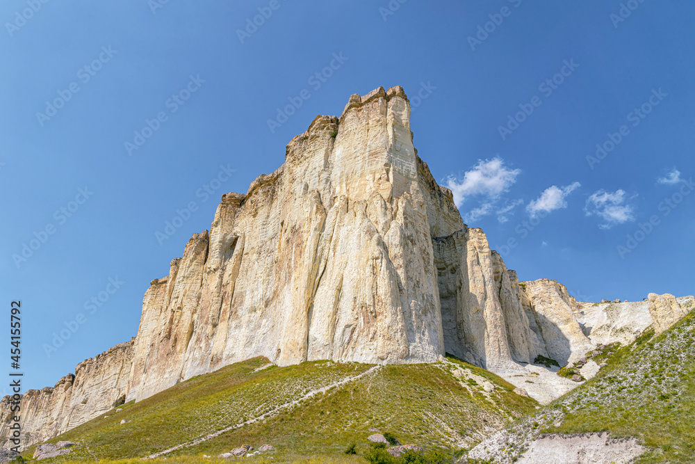 white chalk limestone rock against a blue sky aerial view