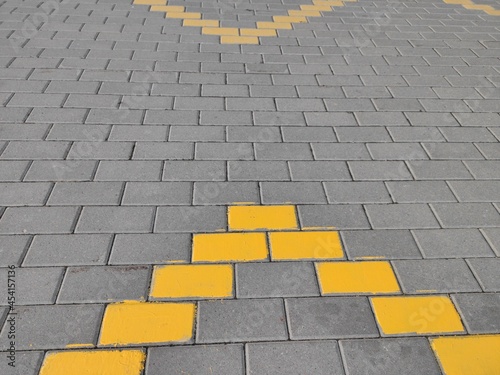 Wallpaper Mural Gray paving slabs with a pattern of yellow tiles Torontodigital.ca