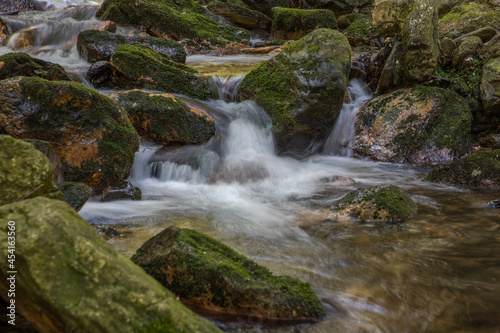 cascade and boulders in a mountain stream