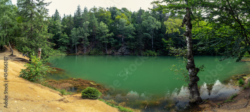 Fototapeta Naklejka Na Ścianę i Meble -  Colourful lakelets in Rudawy Janowickie, Wiesciszowice, lower Silesia, Poland