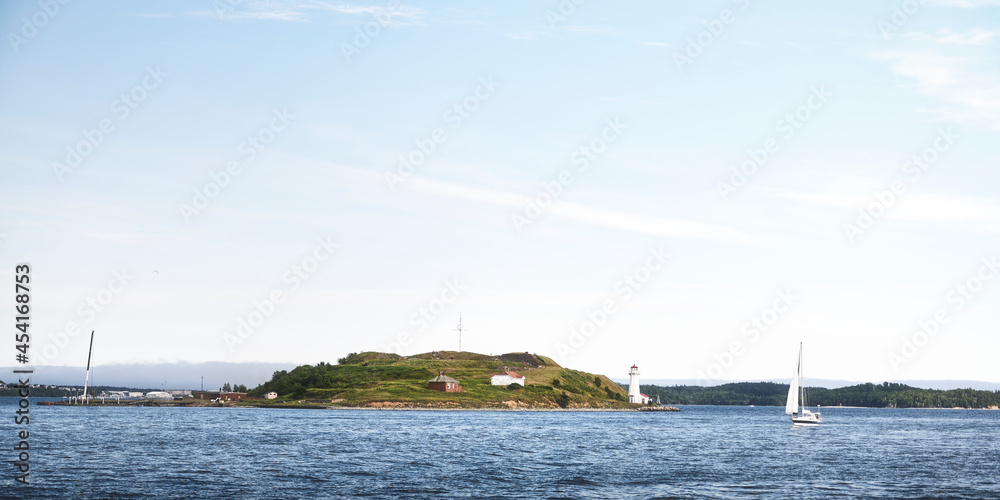 Small island with lighthouse
