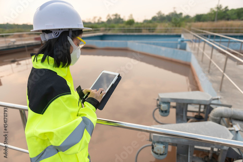 Environmental engineers work at wastewater treatment plants,Water supply engineering working at Water recycling plant for reuse