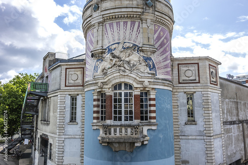 38m Nantes LU Tower or Le Lieu Unique (unique spot, 1885) on banks of Saint-Felix canal. Nantes, Loire-Atlantique, France. photo