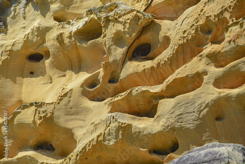Colourful sandstone rock formations on the Cantabrian coastline. Mount Jaizkibel, Basque Country, Spain photo