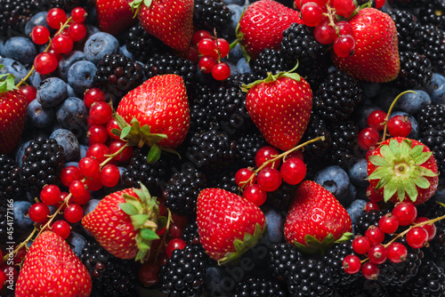 Fototapeta Naklejka Na Ścianę i Meble -  Blackberry, raspberry, blueberry,  red currant and mint background.