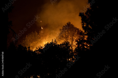 Flames approaching Highway 50 during Caldor Fire in California © kcapaldo