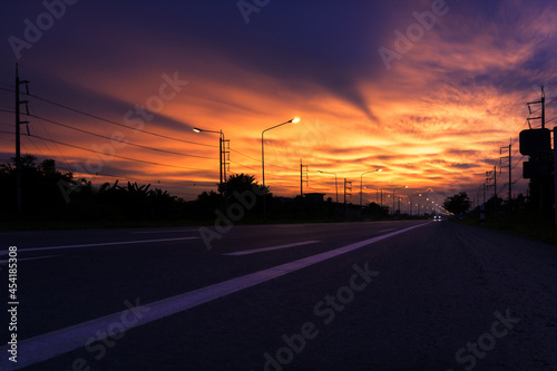 One car ready highway (motorway) to travel before sunset
