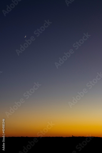 moon slivers and sunsets © barrenboy1