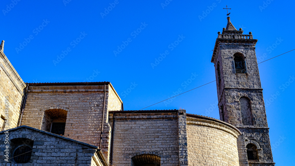 Fototapeta premium detail, streets and architecture of Tempio Pausania, Sardinia, Italy. Bell tower
