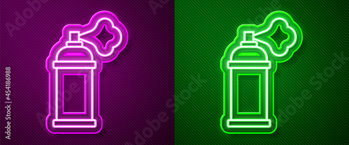 Glowing neon line Paint spray can icon isolated on purple and green background. Vector