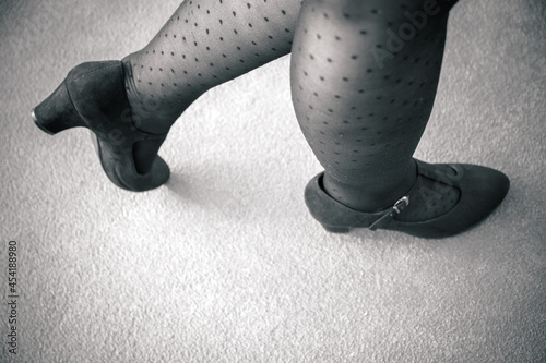 Foto Legs of a woman in sexy polka dot stockings