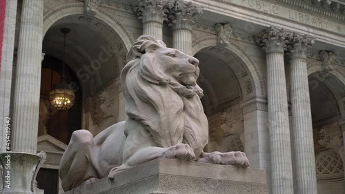 Lion sculpture at entrance to New York public library at 5th avenue in Manhattan photo