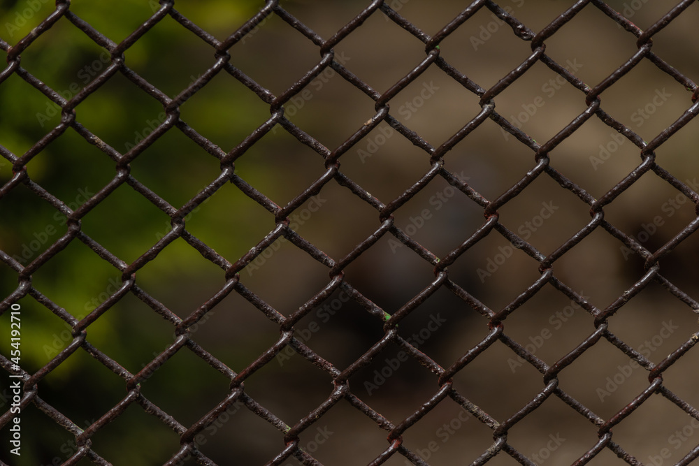 Cage with iron net and fence in ZOO garden Cage with iron net and fence in ZOO garden