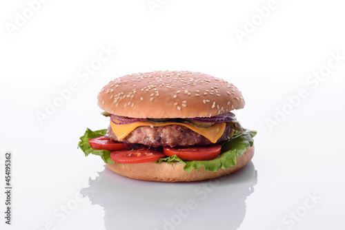 Craft beef burger and french fries on a white background