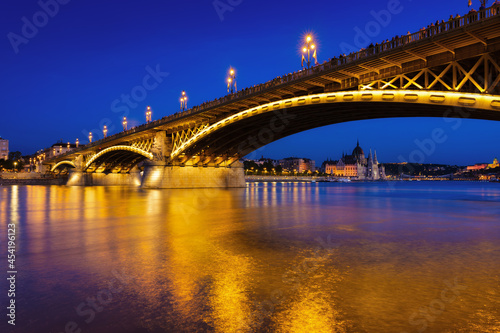 View of bridges in Budapest, Hungary. Parliament building, bridges and the Danube River.  Classic blue hour photo. © biletskiyevgeniy.com