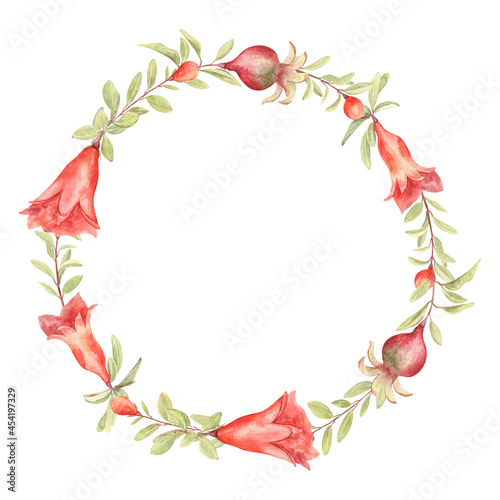 Floral wreath of pomegranate fruit and flowers; for greeting cards and invitations. Watercolor hand drawn botanical illustration on white isolate background. 