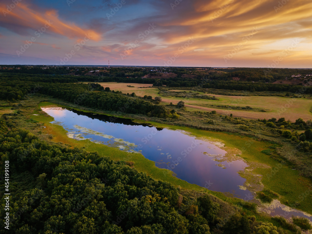 Natural landscape. Lake at the sunset, aerial view