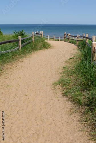 Sand trail leading towards a beach