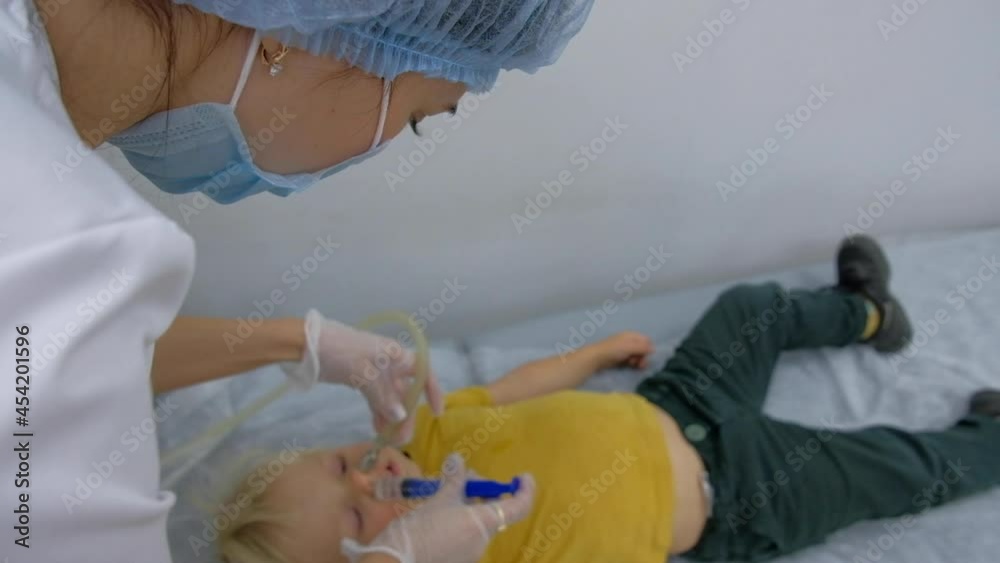 Nasal lavage method of transferring fluid. Washing the baby's nose in