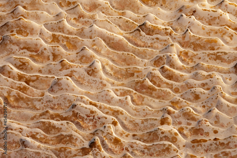 Natural travertine stone close up, abstract background Natural travertine stone close up, abstract background