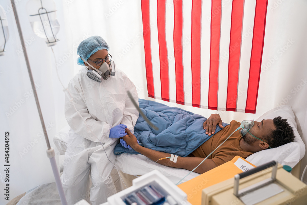 Hopeless mood on infected covid 19 patient during lying on bed Hopeless mood on infected covid 19 patient during lying on bed
