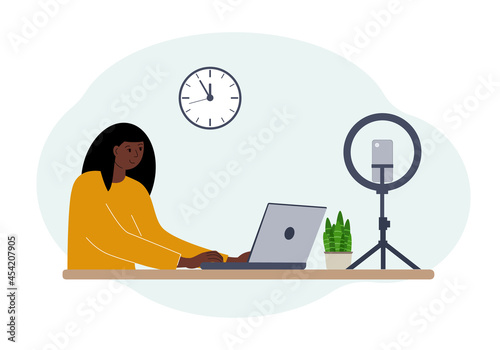 Illustration of a female blogger at the table with a laptop. Online filming of a training course or blog