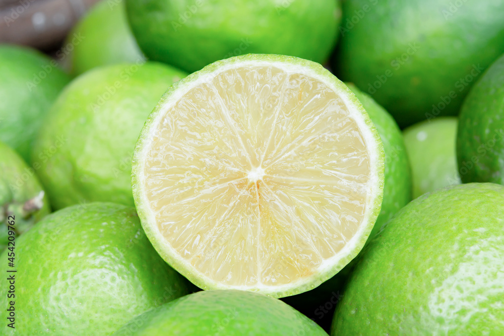 Lime slice citrus fruits background. Fresh juicy limes. Healthy food. Lime slice citrus fruits background. Fresh juicy limes. Healthy food.