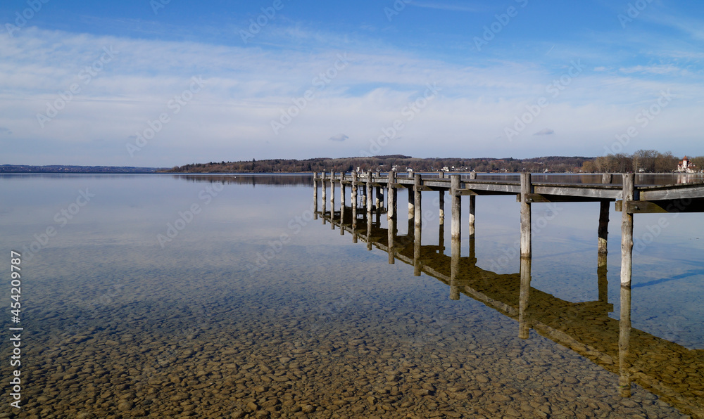 a wooden pier on lake Ammersee in Germany