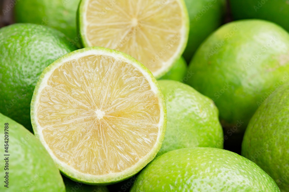 Lime slice citrus fruits background. Fresh juicy limes. Healthy food. Lime slice citrus fruits background. Fresh juicy limes. Healthy food.