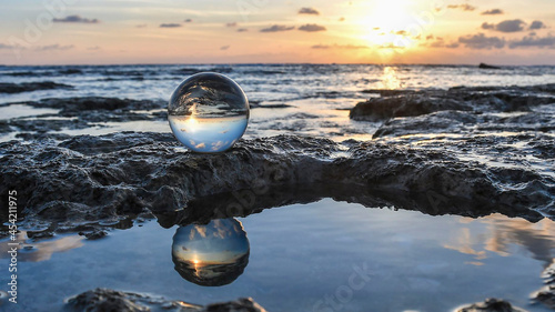 dead sea sunset reflecting in a crystal ball