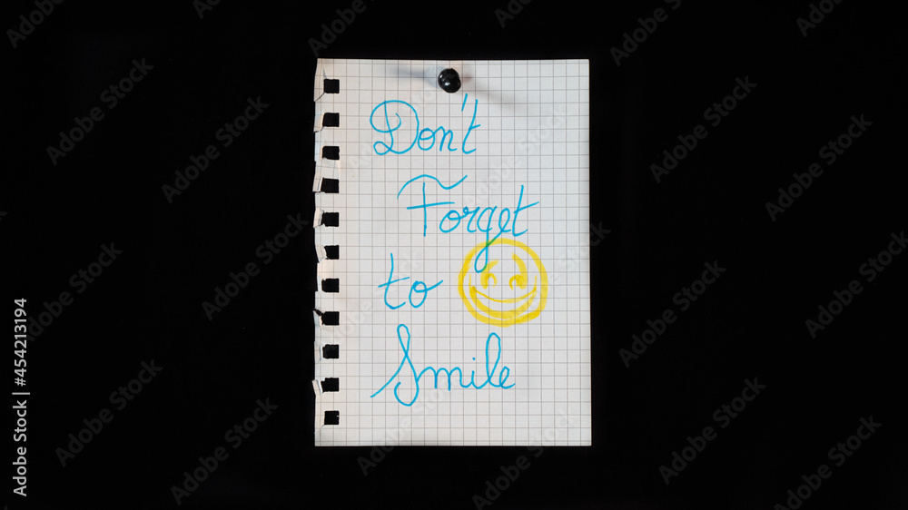 Obraz premium Hand written message on a ripped notebook sheet,