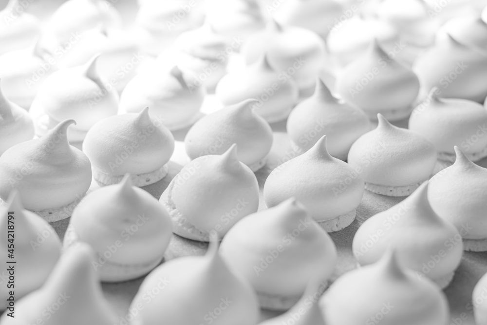 Homemade meringue cookies. White sweet meringue. Tray of meringues Homemade meringue cookies. White sweet meringue. Tray of meringues