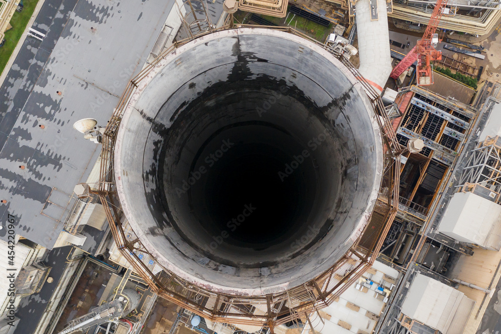 Large chimney at a power plant, close-up top view, environmental pollution