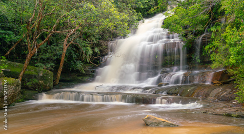 long exposure shot of somersby falls  with high spring flow  near gosford