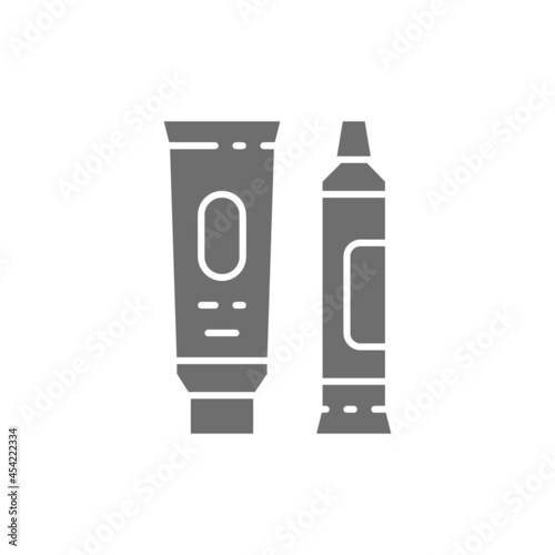 Hand cream, cosmetic tubes, toothpaste grey icon.
