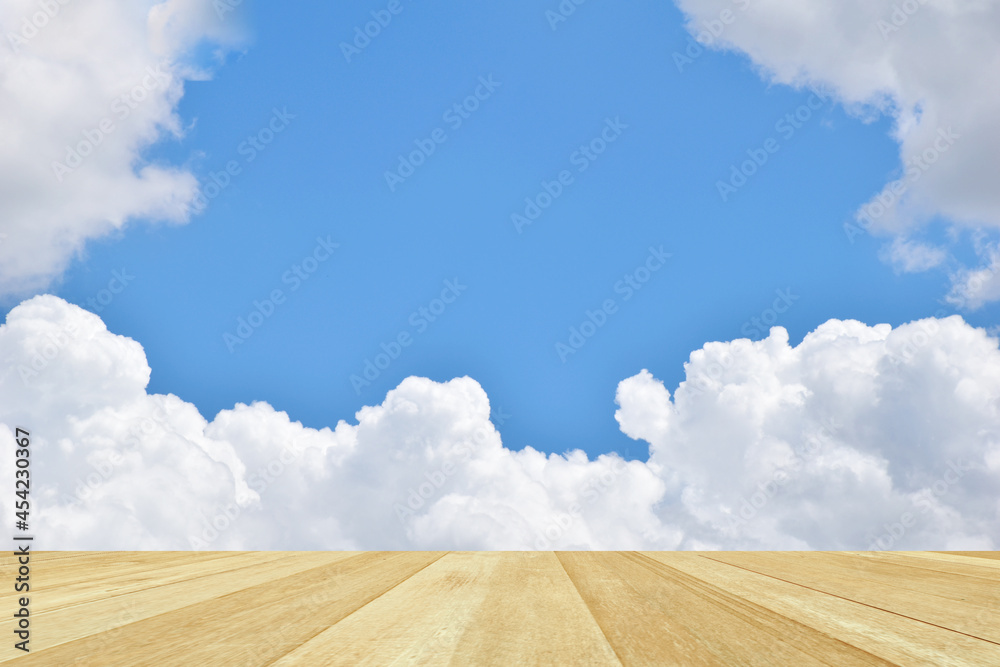 Fototapeta premium Empty top wooden table on blue sky with cloud for background